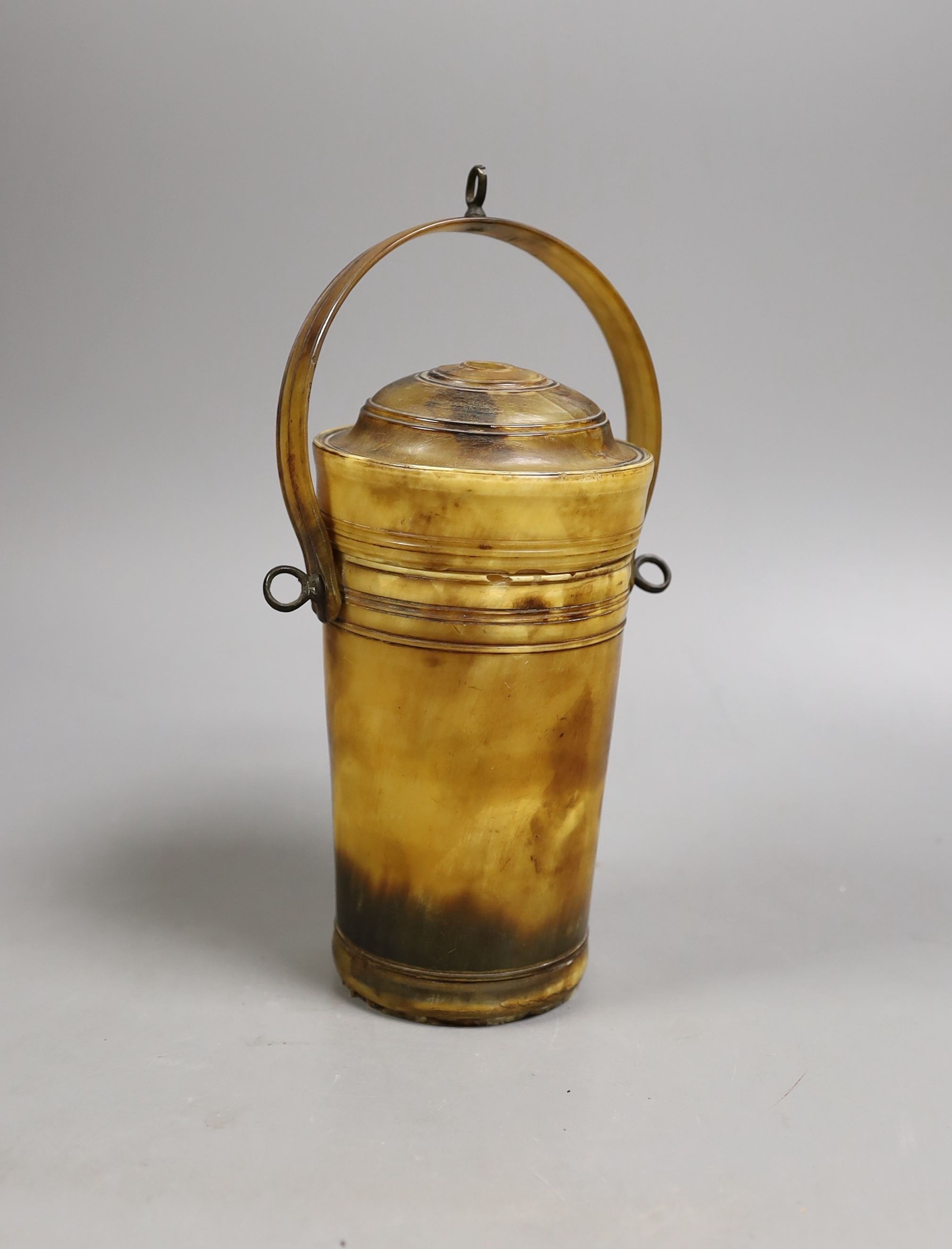 A 19th century horn portable beaker, 23 cms high including handle.